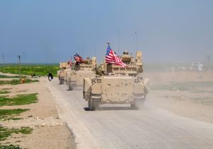 The U.S. military sends reinforcements to its bases in Deir ez-Zor province in Syria on Aug. 13. (Omer Al Diri/Anadolu Agency via Getty Images)